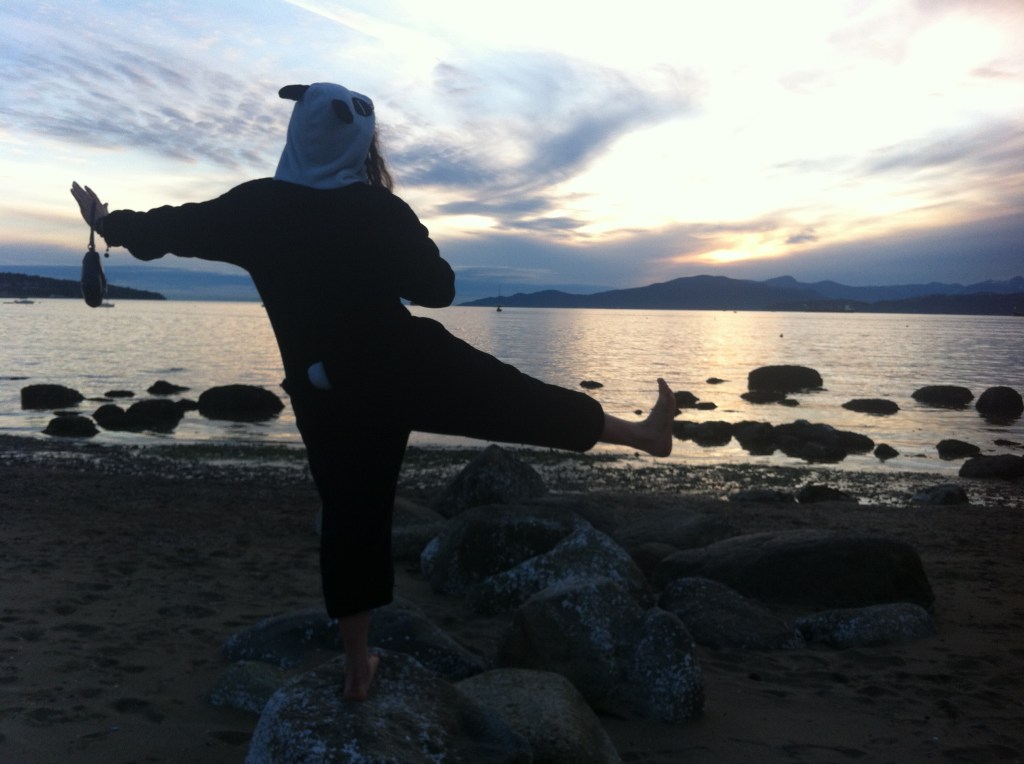 My roommate was the first one to have left and relocated for work. When she came back to visit, we went down to the beach; she wore a panda suite.